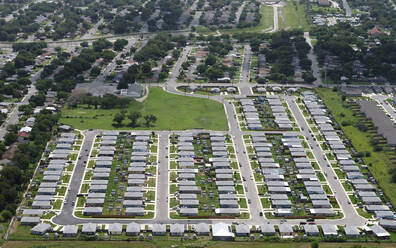 USA, Texas, San Antonio, Aerial view of suburban homes in summer - BCDF00601