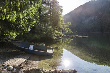 Rowboat left on shore of Lake Toplitz in summer - AIF00737