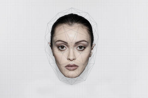 Face recognition analyzing on woman's face over white background - EIF01947