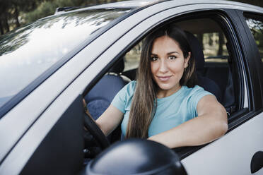 Young woman driving car - EBBF04542