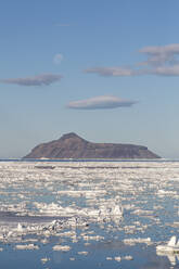 The nearly full supermoon over Cogburn Island, Weddell Sea, Antarctica, Polar Regions - RHPLF20570