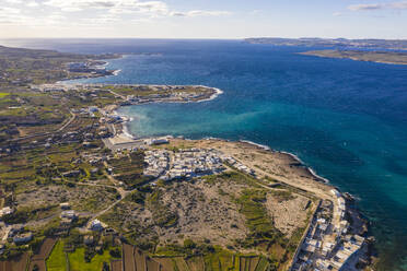 Malta, Northern Region, Mellieha, Aerial view of blue bay and coastal town - TAMF03182