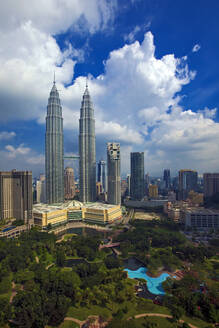 Malaysia, Kuala Lumpur, Clouds over KLCC Park and Petronas Towers - EAF00111