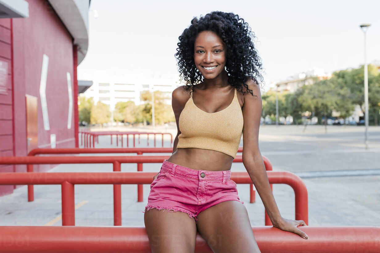 Pretty Woman In Sports Bra Smiling At Free Stock Photo and Image