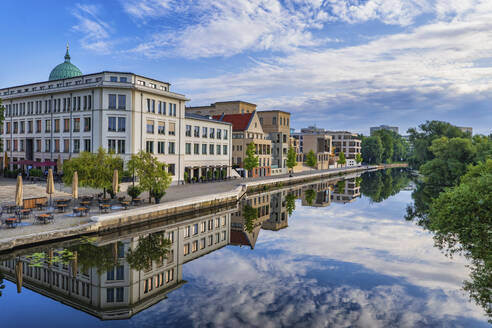 Germany, Brandenburg, Potsdam, City buildings reflecting in Havel river canal - ABOF00680