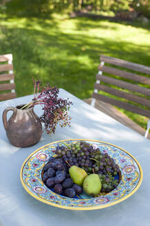 Fresh fruits on outdoor table - GISF00843
