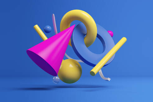 Three dimensional render of colorful geometric shapes floating against blue background - JPSF00249