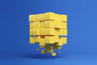 Three dimensional render of bunch of yellow cubes floating against blue background - JPSF00250