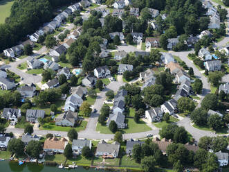USA, Virginia, Chesapeake, Aerial view of suburban homes in summer - BCDF00608