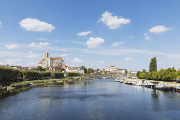 France, Yonne Department, Auxerre, Yonne river in summer with Auxerre Cathedral and Abbey of Saint-Germain dAuxerre in background - GWF07170