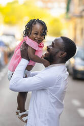 Cheerful father and daughter on road - OCMF02257