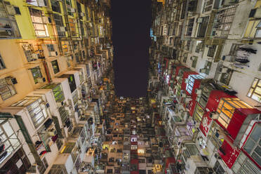 Low angle view of balconies and windows of Monster Building in Quarry Bay. - MINF16385