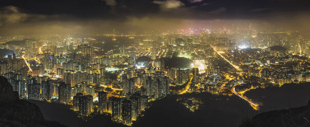 Hong Kong island seen from the hills, lit up at night. - MINF16386