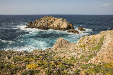 Coastal landscape of Mediterranean Sea with clear line of horizon in background - JMF00592