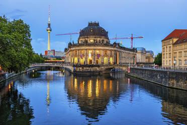 Germany, Berlin, River Spree canal and Bode Museum at dusk - ABOF00773