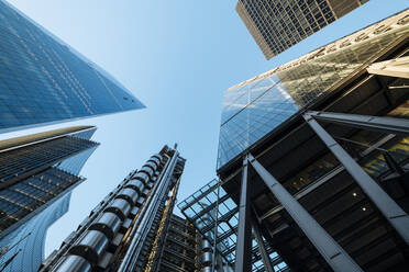 UK, London, Lloyds building and other skyscrapers seen from below - ISF25279