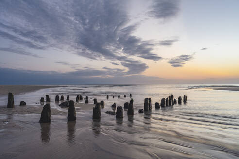 Old damaged groyne at dusk - KEBF02031