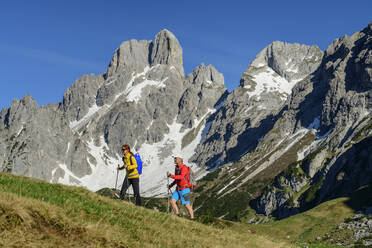 Hikers hiking on mountain at Salzburg, Austria - ANSF00049