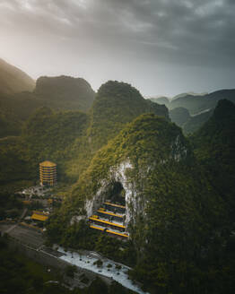 Aerial view of valley with temples in Guizhou province, China. - AAEF13259