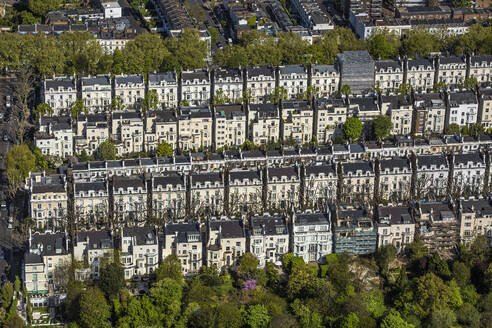 UK, London, Aerial view of rows of Victorian townhouses in Holland Park - ISF25343