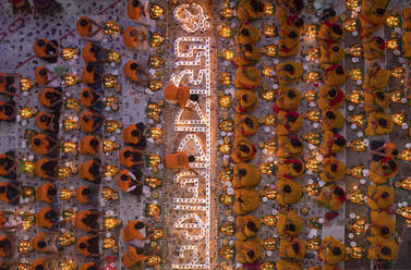 View of many people praying in a mosque burning incense before breaking the fasting during Rakher Upobash festival, Narayanganj, Bangladesh. - AAEF13271