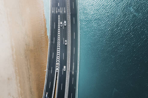 Aerial view of highway section along the coast in Xiamen, Fujian, China. - AAEF13480