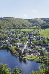 Einruhr townscape by lake on sunny day, Eifel, North Rhine Westphalia, Germany - GWF07259