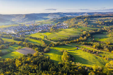 Cityscape and scenic green landscape in autumn, Germany - STSF03096