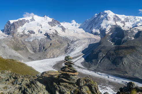 Scenic view of Gorner Glacier with cairn in foreground - RUNF04686