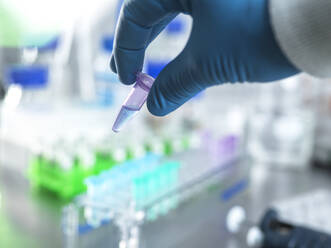 Biomedicine, Scientist preparing a chemical solution in the lab. - CAVF95340