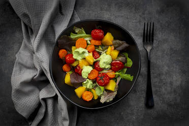 Studio shot of bowl of vegan salad with baked vegetables - LVF09172