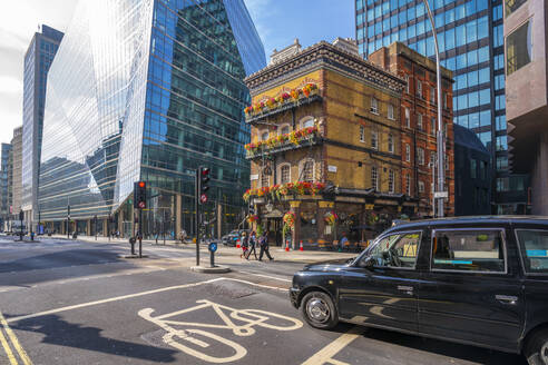 View of The Albert, an old London pub, in Victoria Street surrounded by modern buildings, Westminster, London, England, United Kingdom, Europe - RHPLF21014