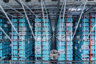 Blue containers in racks at warehouse - DIGF16995