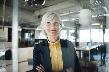 Senior businesswoman with arms crossed in office - JOSEF06026