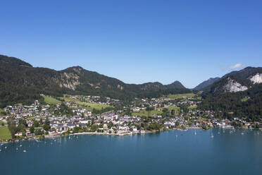 Austria, Salzburg, Saint Gilgen, Drone view of village on shore of Lake Wolfgang in summer - WWF05853