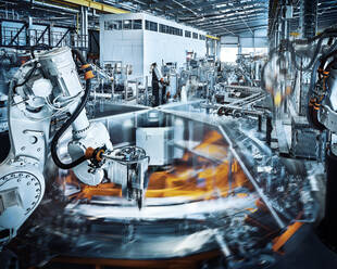 Robotic arms operating inside modern factory - CVF01752