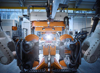 Robotic arms operating inside modern factory - CVF01754
