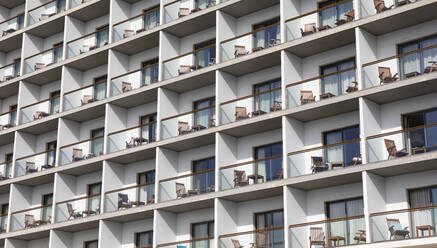 Portugal, Azores, Ponta Delgada, Rows of identical apartment building balconies - WWF05905