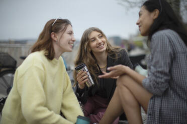 Young women friends talking - CAIF31922