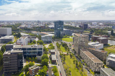 Germany, Bremen, Aerial view of financial district with Weser Tower and Bomers Spitze - TAMF03263