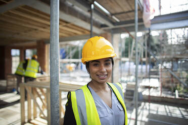 Portrait confident forewoman at construction site - CAIF32149