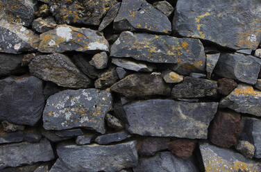 Volcanic rocks stack making stone wall - WWF05930