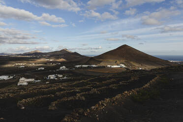 Scenic view of landscape with mountains at Lanzarote, Spain - MRAF00818