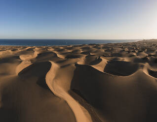 Sand dunes by sea at Grand Canary, Canary Islands, Spain - RSGF00767