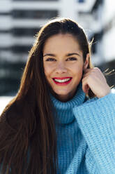 Happy beautiful woman wearing turtleneck sweater - PGF00990