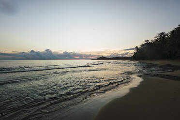 Empty beach at sunset in Limon, Costa Rica - RSGF00803