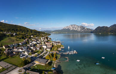 Austria, Upper Austria, Unterach am Attersee, Drone view of village on shore of Lake Atter - WWF05996