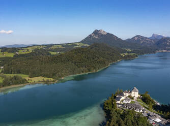 Austria, Salzburg, Hof bei Salzburg, Drone view of Lake Fuschl and Schloss Fuschl in summer - WWF06013