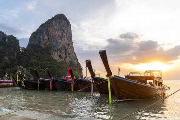 Longtail boats moored on shore at Railay beach, Krabi Province, Thailand - CHPF00829