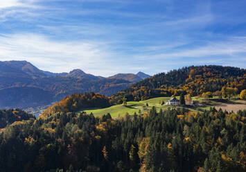 Drone view of isolated farmhouse in Salzkammergut Mountains - WWF06016